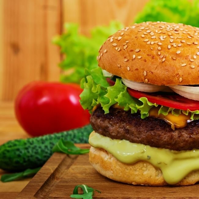 delicious-handmade-burger-on-wooden-background-clo-RDNTEG9.jpg